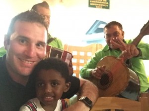 Reflecting on a new focus of strengthening relationships: Aaron Blank with his son, Ermias, at a restaurant in Mexico during the holidays.