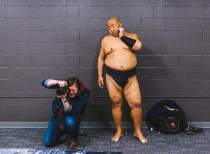 Genna Martin photographer with sumo wrestler